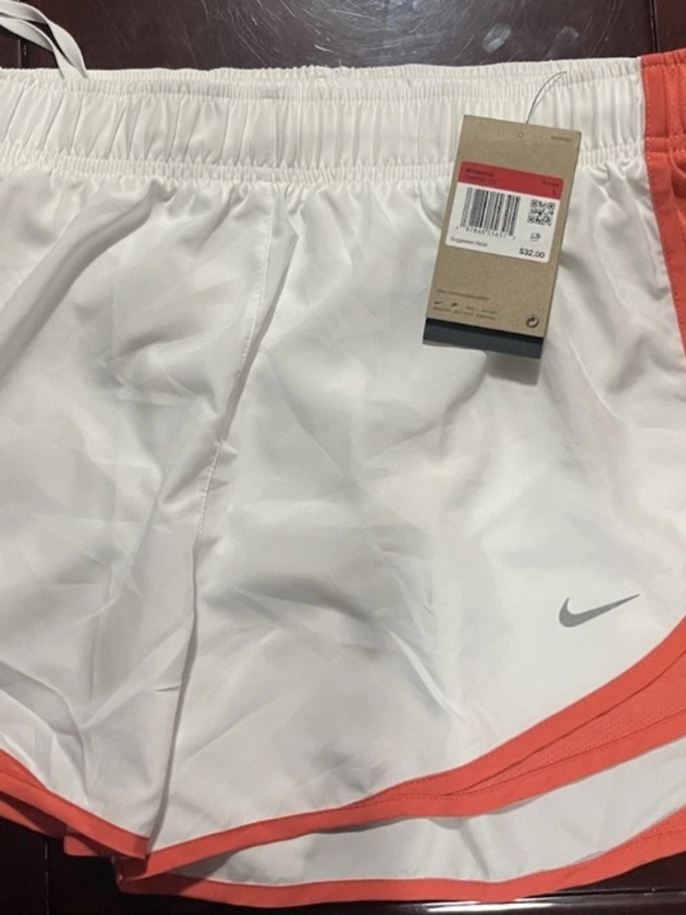 Nike Women’s White and Coral Athletic Shorts